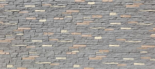 faux stone panels in shades of gray, beige, and tan in a slate stone texture